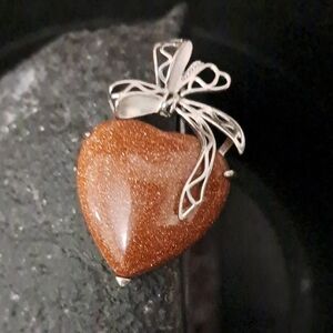 Elegant Silver and Brown Heart Pendant